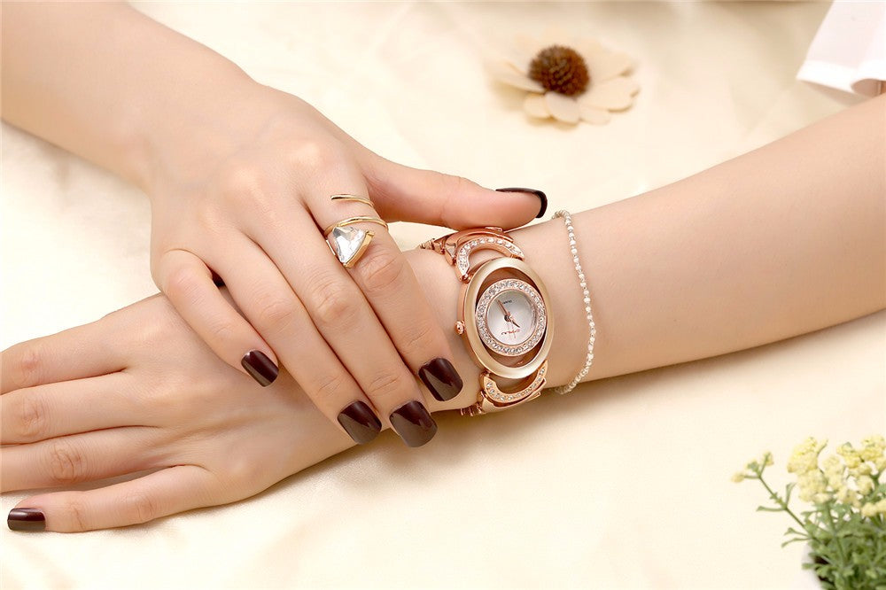 Ladies' luxury stainless steel bracelet watch with rhinestones and quartz movement, stylish accessory from The Clothing Company Sydney.