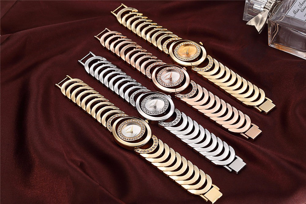 Ladies' luxury stainless steel bracelet watch with rhinestones and quartz movement by The Clothing Company Sydney.