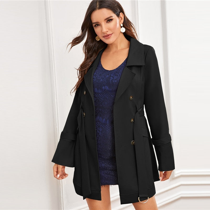 Black double-breasted coat with notch collar, D-ring belt, and solid design, stylish outerwear for women by The Clothing Company Sydney.