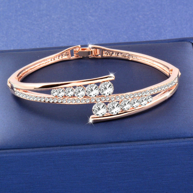 Luxury cubic zirconia hollow bangle cuff bracelet with sparkling crystals, stylish accessory from The Clothing Company Sydney.