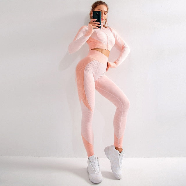The Clothing Company Sydney fitness set with seamless long sleeve zip-up top and matching athletic leggings, ideal for gym workouts.