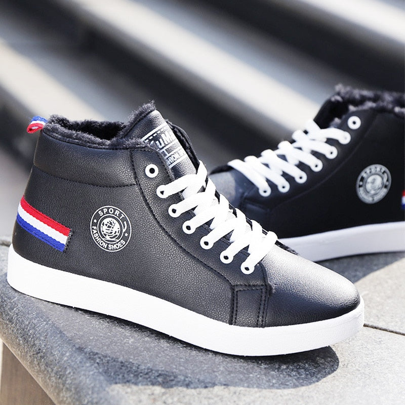 Black and white waterproof plush ankle high-cut sneaker boots by The Clothing Company Sydney, featuring warm, cozy footwear for cold weather.