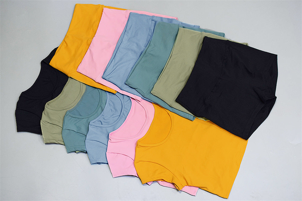 Two-piece sports suit set by The Clothing Company Sydney, featuring athletic shorts and short sleeve shirt for gym and yoga workouts.