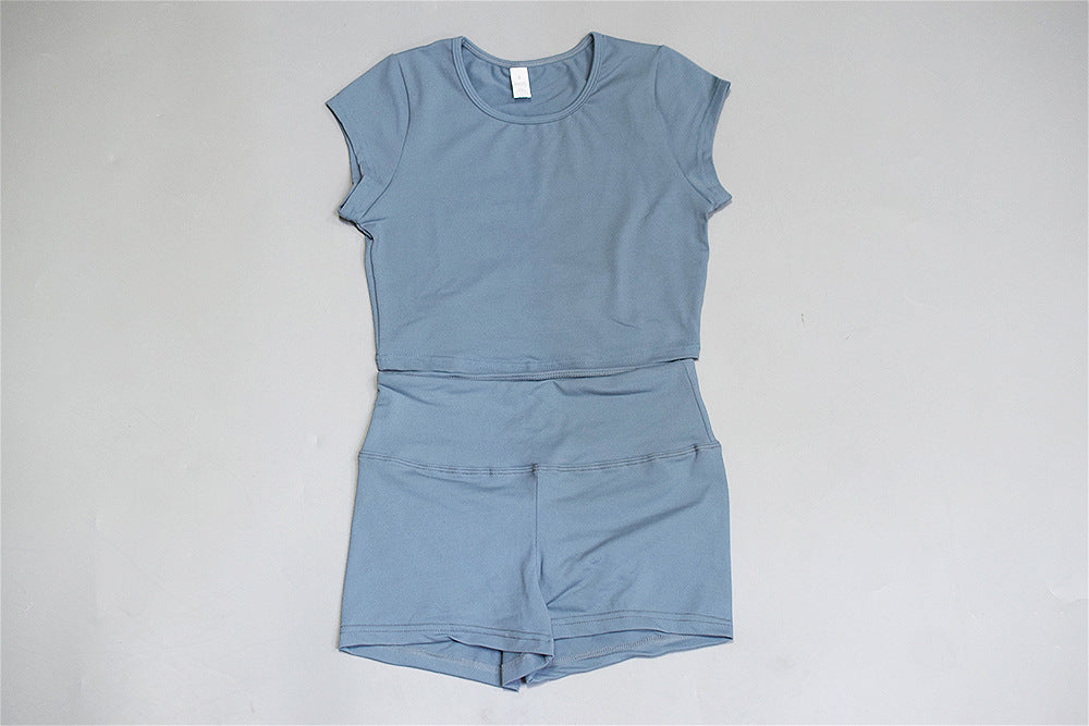 The Clothing Company Sydney 2-piece sports suit set with athletic shorts and short sleeve shirt for yoga and gym fitness activities.