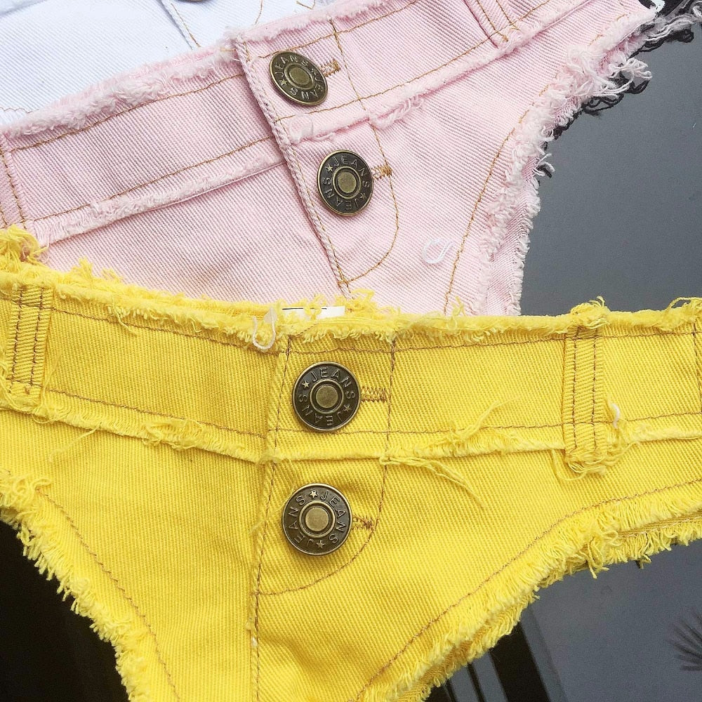 Black low-waist super short denim shorts for ladies, streetwear style, from The Clothing Company Sydney, perfect for casual beach outings.