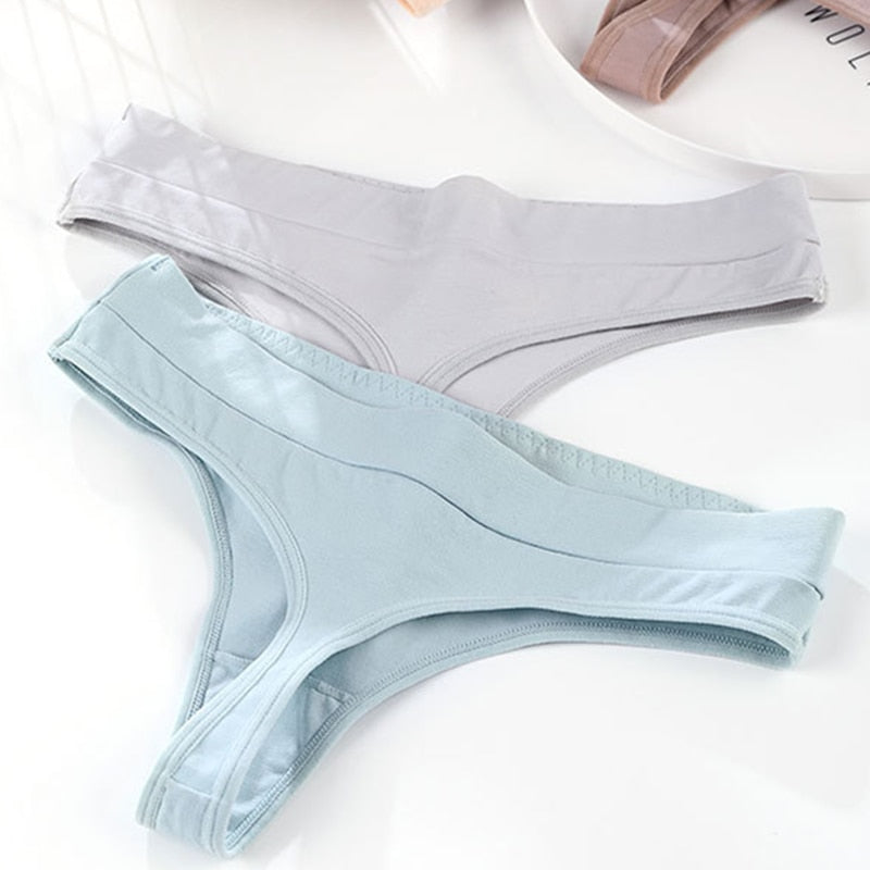 Three-pack of The Clothing Company Sydney sexy thong panties, low-rise G-strings, and string underwear briefs for women.