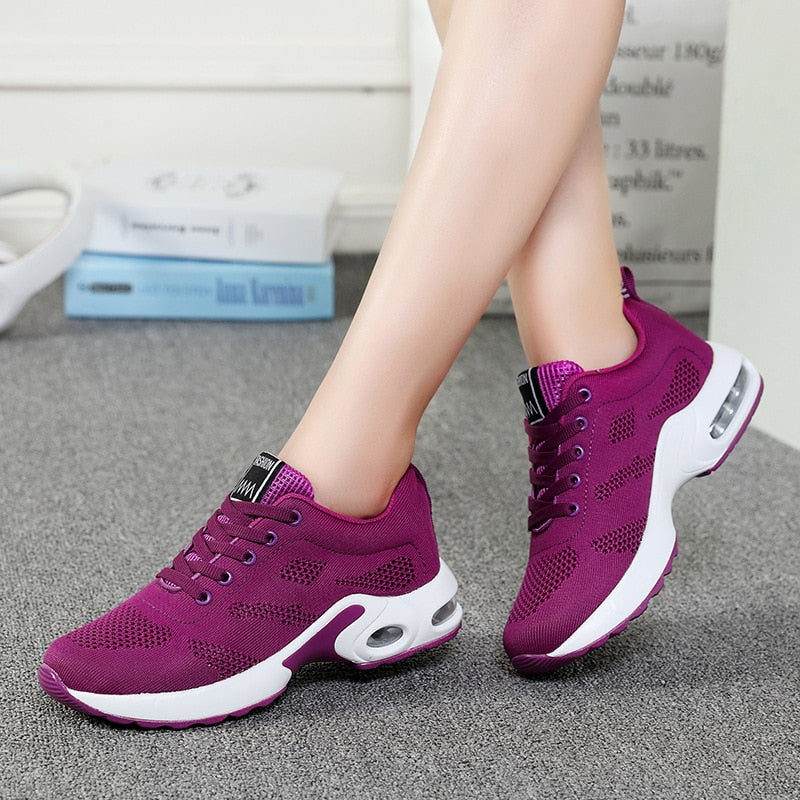 Lightweight outdoor sports shoes by The Clothing Company Sydney with breathable mesh, air cushion, lace-up design, ideal for running.