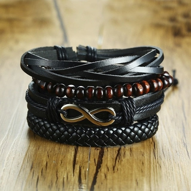 Four-piece men's braided leather bracelet set with wood beads, life tree charm, and tribal style accents by The Clothing Company Sydney.