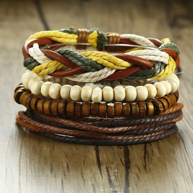 4-piece set of men's braided wrap PU leather bracelets with life tree charm, wood beads, and tribal style design.