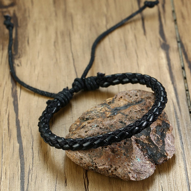 Set of four braided leather bracelets with wooden beads, life tree charm, and tribal style for men, from The Clothing Company Sydney.