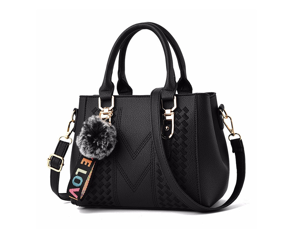 Embroidery handbag with fur ball detail, PU leather shoulder bag, crossbody tote, and female purse from The Clothing Company Sydney