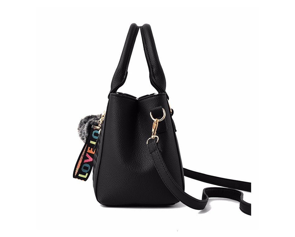 Embroidery handbag with fur ball, designer PU leather shoulder and crossbody bag for women, featuring a stylish tote and purse design.