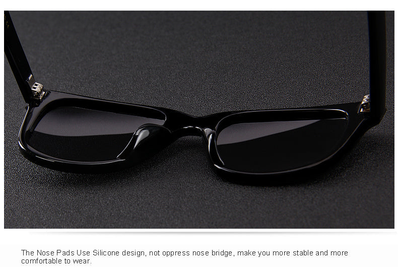 Classic retro sunglasses by The Clothing Company Sydney with rivet details, polarized lenses, and 100% UV protection.