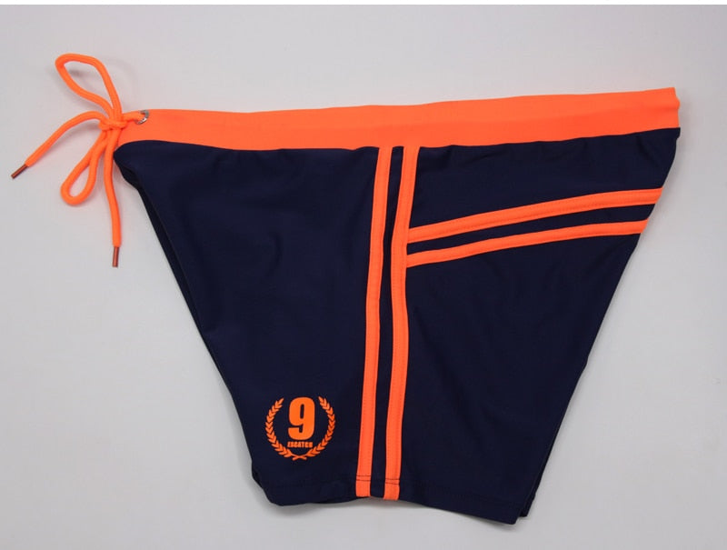 Men's breathable swim trunks by The Clothing Company Sydney featuring lightweight fabric, quick-dry material, and a classic fit.