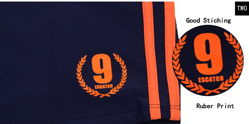 Men's breathable swim trunks from The Clothing Company Sydney featuring boxer brief style and vibrant beach swimwear design.