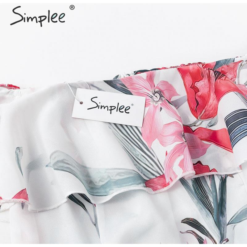 Bohemian floral print off-shoulder summer jumpsuit with ruffled details and long sash, perfect for beach and casual wear.