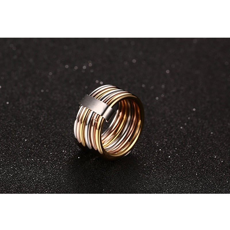 Stacked wide chain cocktail rings in three colors, featuring interlocked plain bands for women, by The Clothing Company Sydney