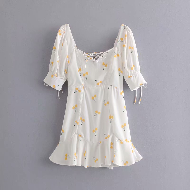 Elegant vintage summer white and yellow cherry print mini dress by The Clothing Company Sydney, with puff sleeves and high waist.