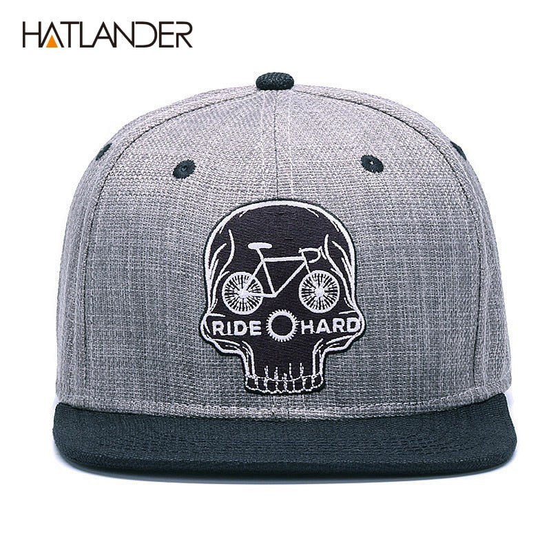 Black baseball snapback cap with embroidered skull design, stylish hip hop accessory by The Clothing Company Sydney.