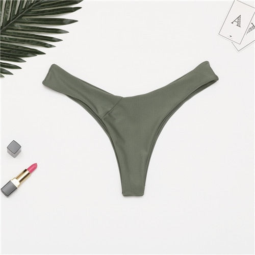 Brazilian women's thong bikini bottoms by The Clothing Company Sydney, low waist solid swim trunks with cheeky fit.