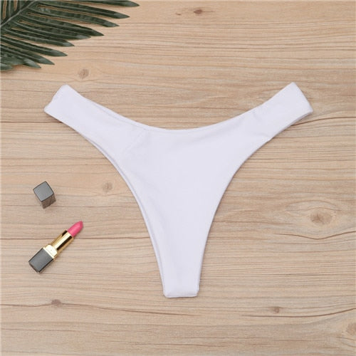 Brazilian women's thong swimsuit briefs with low waist, solid color, cheeky bikini bottom, by The Clothing Company Sydney