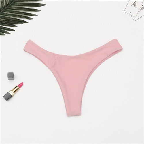 Brazilian women's thong swimsuit briefs by The Clothing Company Sydney, low waist, solid color, cheeky bikini bottom, swim trunks