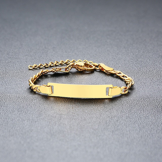 Gold-tone stainless steel personalized baby name bracelet with adjustable fit, crafted by The Clothing Company Sydney.