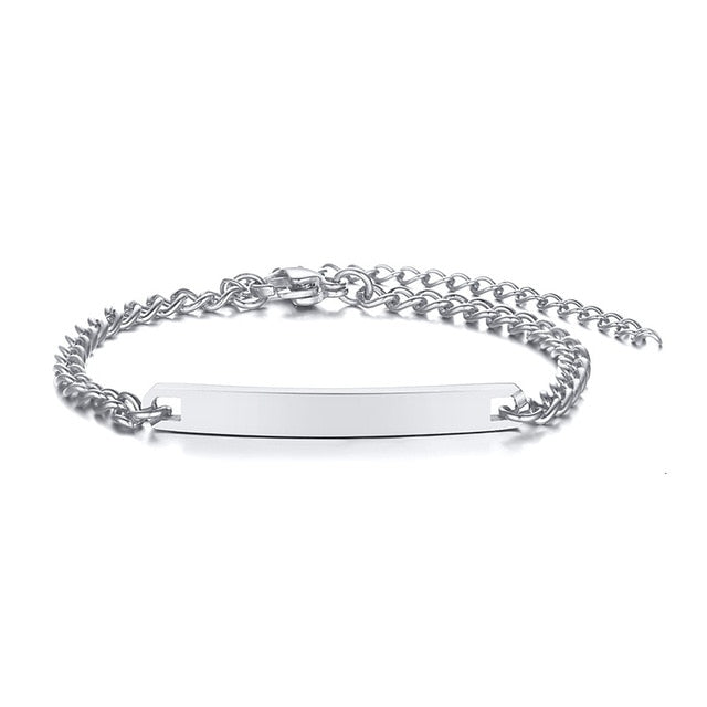 Gold-tone personalized baby name bracelet from The Clothing Company Sydney, adjustable stainless steel jewelry with custom engraving.