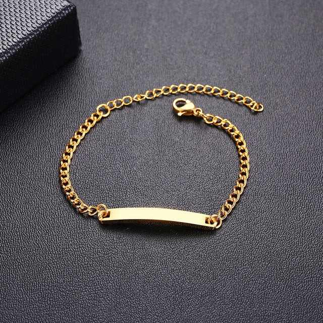 Gold-tone personalized baby name bracelet made of solid stainless steel, adjustable, from The Clothing Company Sydney.