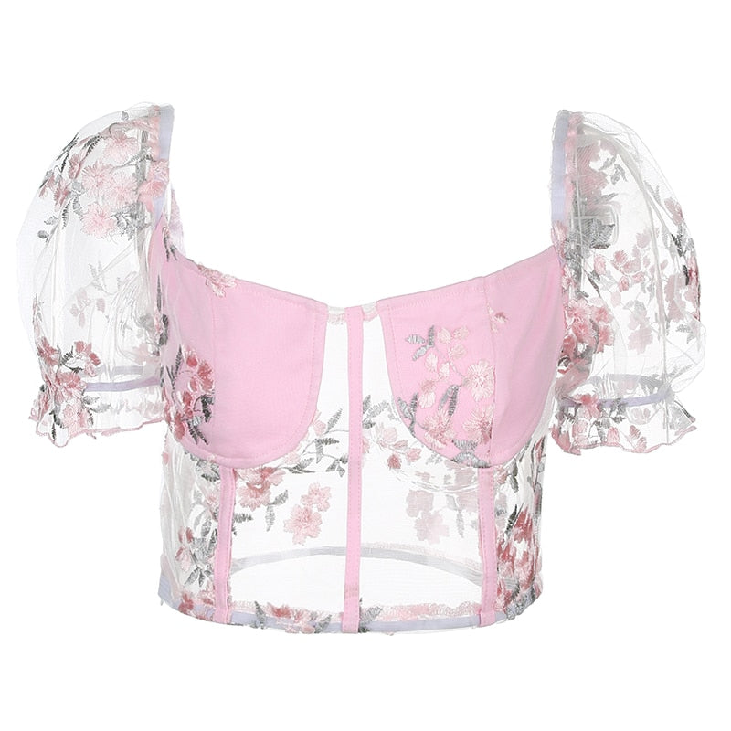 Pink mesh cropped bustier top with square neckline, embroidery, transparent fabric, puff sleeves, ideal for summer fashion.