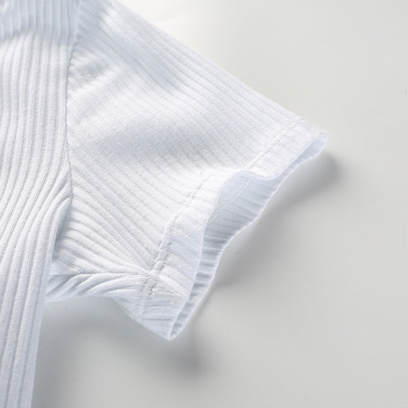 Autumn winter skinny long sleeve button-up bodysuit by The Clothing Company Sydney, shown in a close-up of the front.