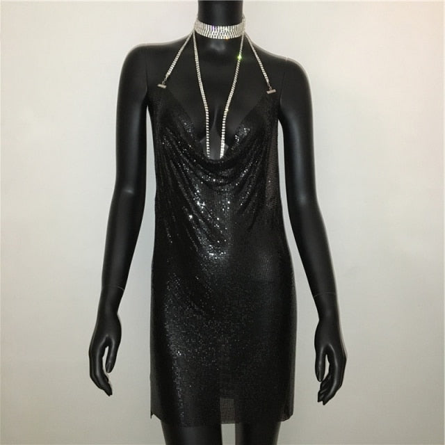 Deep V neck halter split sequined dress for women with backless design and rhinestone chain details, perfect for party occasions.