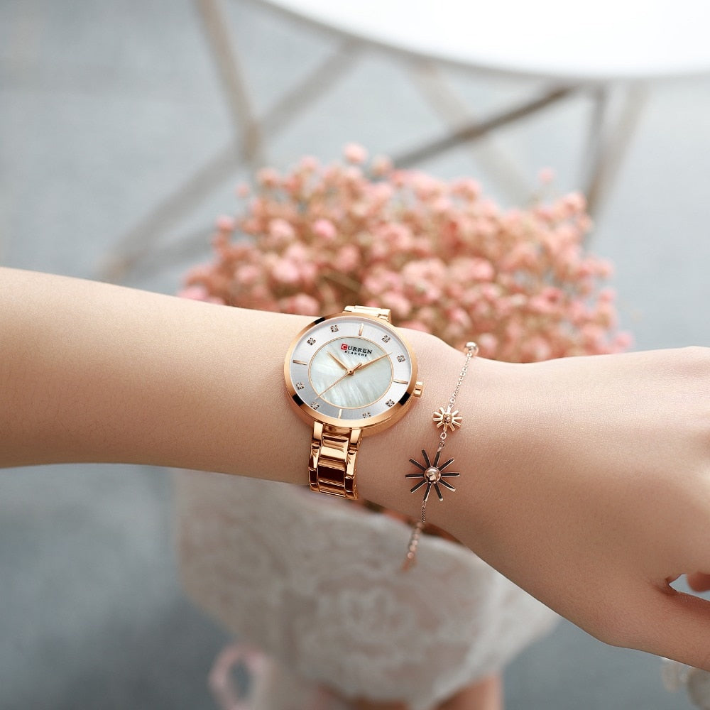 Ladies fashion luxury rhinestone dial quartz wristwatch with water-resistant stainless steel band from The Clothing Company Sydney.