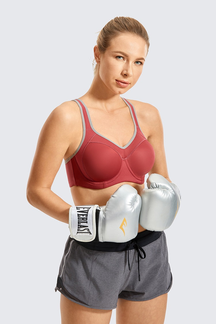 Women's moisture-wicking high-impact sports bra with padded cups, racerback design, underwire support, from The Clothing Company Sydney.