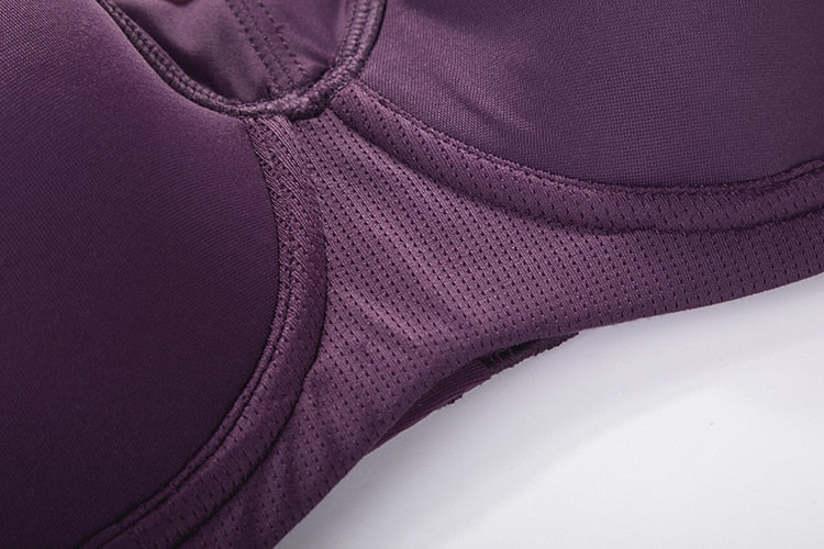 Women's moisture-wicking high-impact sports bra by The Clothing Company Sydney, featuring padded support, racerback design, and underwire.