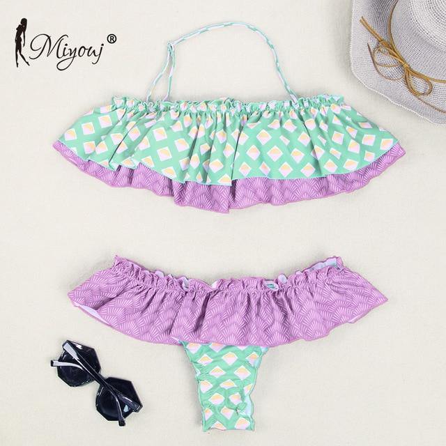 Deep V neck floral print bikini with bow detail and lace-up design, stylish swimsuit from The Clothing Company Sydney.