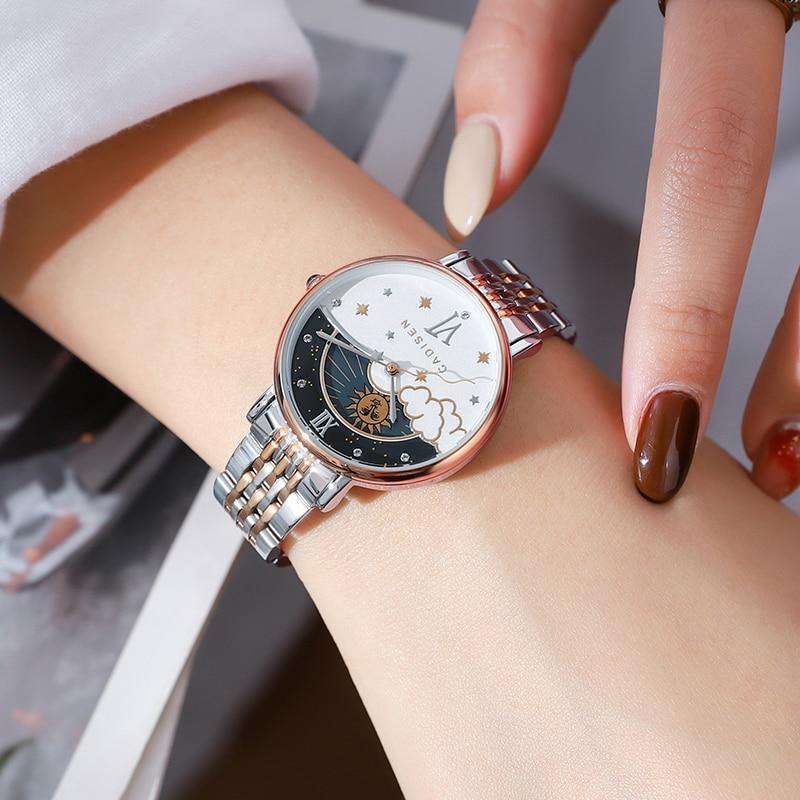 CADISEN women's rose gold quartz wristwatch with moon phase design, elegant fashion accessory for ladies.