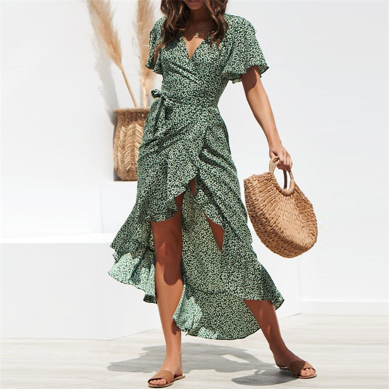Summer beach maxi dress by The Clothing Company Sydney featuring floral print, boho style, ruffles, V-neck, and split design.