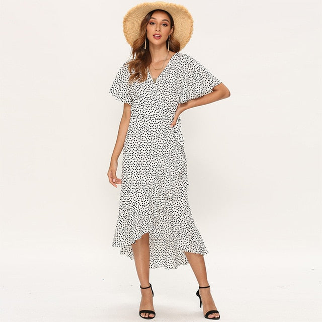 Summer beach maxi dress by The Clothing Company Sydney featuring floral print, ruffles, V-neck, split, and boho casual style.