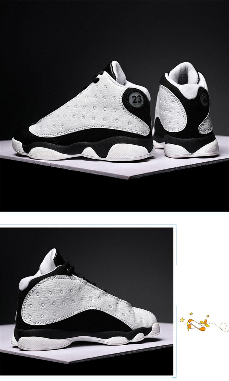 Kids' shockproof and non-slip basketball sneakers for boys and girls by The Clothing Company Sydney, featuring sporty design and durable sole.