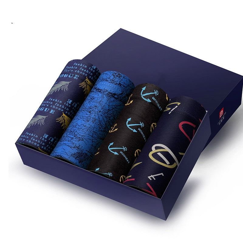 Four pairs of The Clothing Company Sydney men's boxer briefs featuring U convex design, breathable fabric, printed pattern, and soft fit.
