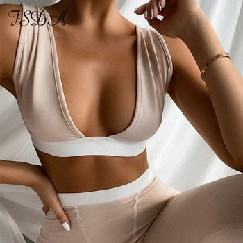 Khaki 2-piece fitness set with v-neck crop top and biker shorts, sleeveless and backless, by The Clothing Company Sydney.