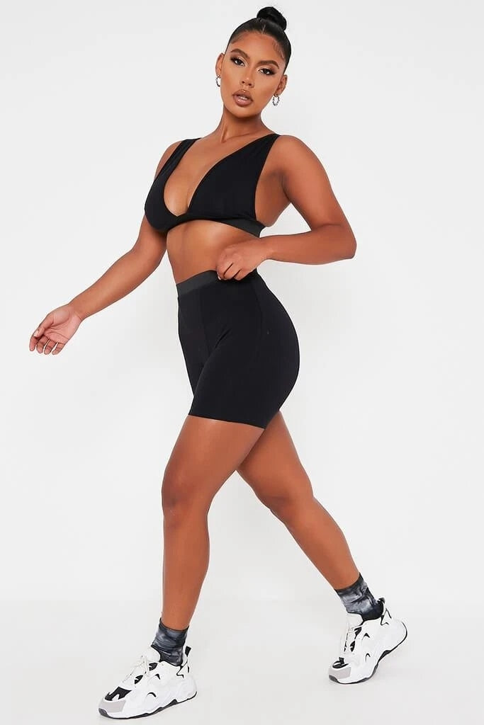 Khaki sleeveless backless v-neck crop top and biker shorts fitness set by The Clothing Company Sydney, casual athletic wear.