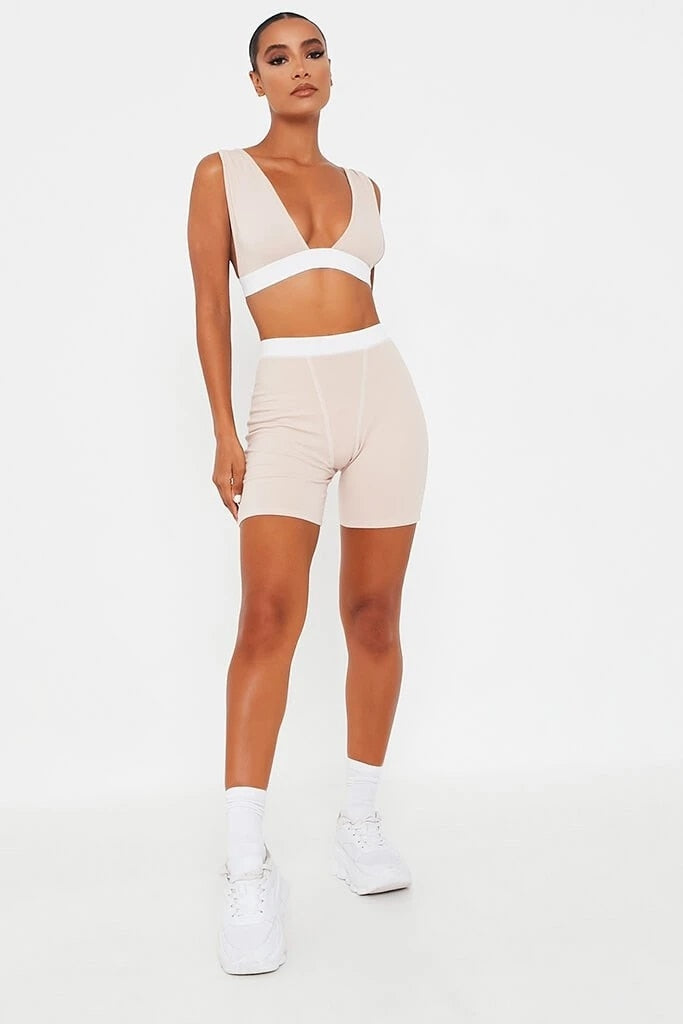 Khaki sleeveless v-neck crop top and biker shorts fitness set by The Clothing Company Sydney, backless design, casual athletic style