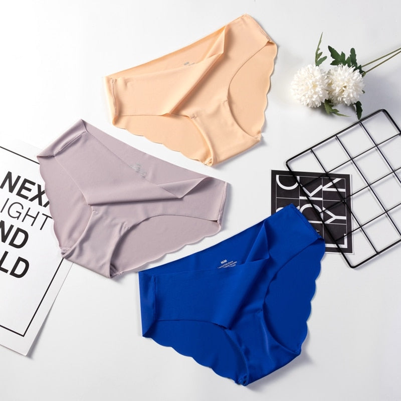 Three-pack of seamless, solid color lingerie briefs from The Clothing Company Sydney, showcasing comfortable underpants for women.