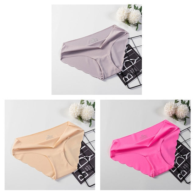 Three pairs of seamless solid color panties from The Clothing Company Sydney, soft and comfortable sexy briefs underwear.
