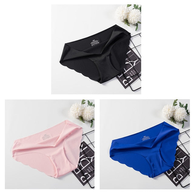 Three pairs of seamless, solid-colored panties from The Clothing Company Sydney, comfortable and sexy brief-style underwear.