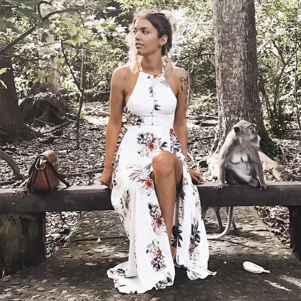 Bohemian floral print summer maxi dress by The Clothing Company Sydney, off-shoulder, backless, with a split, perfect for beach or party wear.