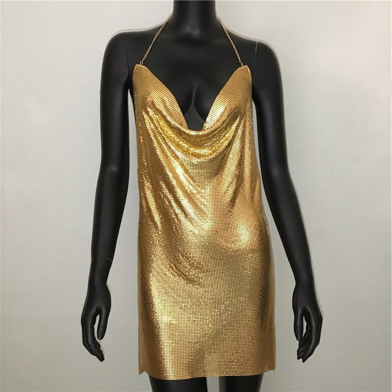 Blackless halter mini dress with deep V neckline, silver metal sequins, and slit, perfect for stage shows and parties.