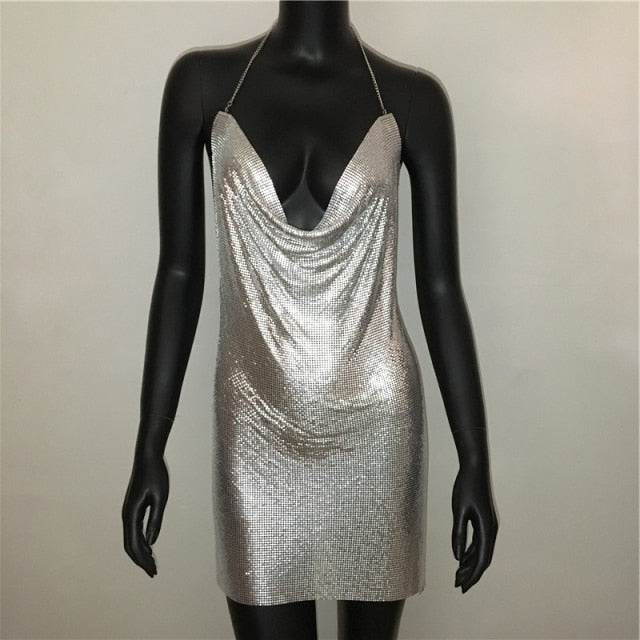 Blackless halter mini dress with deep V neckline, silver sequins, and thigh slit, ideal for stage shows and parties by The Clothing Company Sydney.